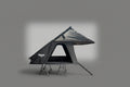 A rooftop tent shown on a gray gradient background.The tent is dark gray/black with a triangular roof shape and visible support legs.