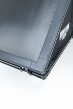 Close up of black carbon rebellion 4x4 rooftop tent on white backround