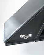 Black roof rack with Rebellion 4x4 logo on a white background